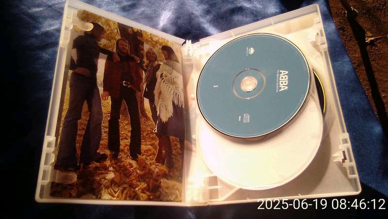 2 x CD's and 1 DVD. ABBA.  The Ultimate Collection.