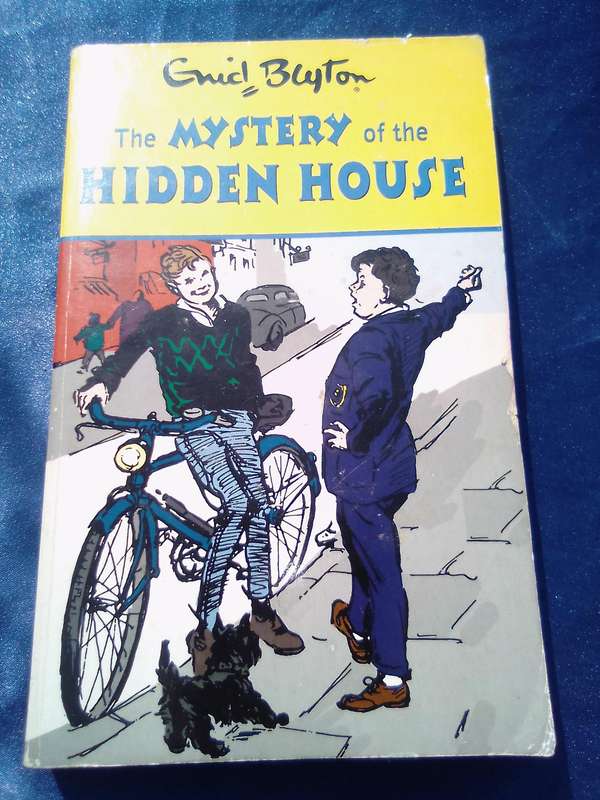 "Enid Blyton.  The Mystery of the Hidden House". Soft cover.