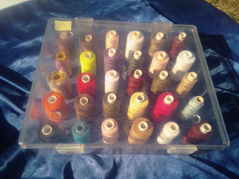 30 Reels of Sewing Threads in their own case.  A