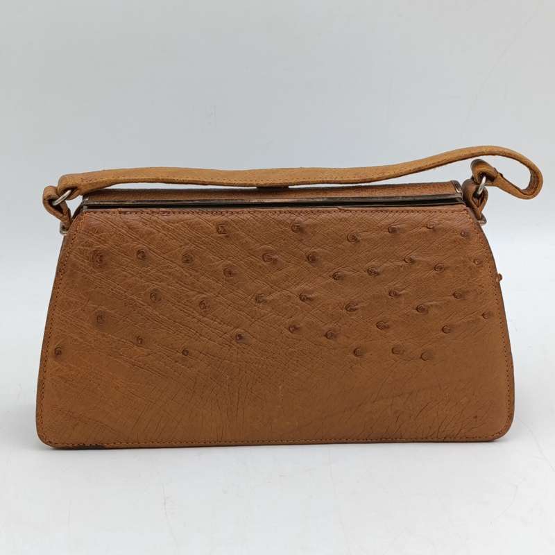 Carbeau ostrich leather handbag with purse good condition, some marks underneath colour tan