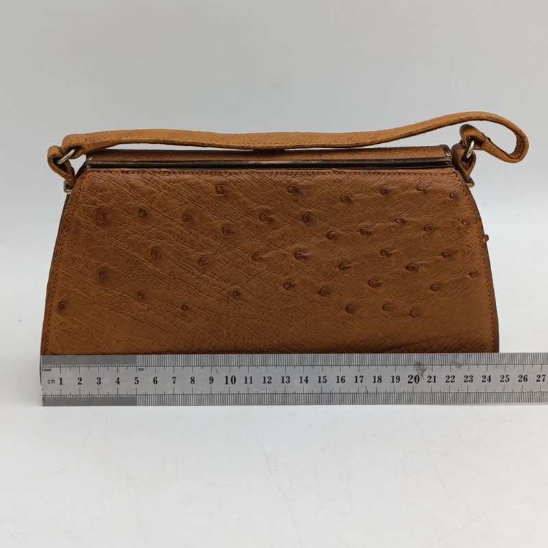 Carbeau ostrich leather handbag with purse good condition, some marks underneath colour tan