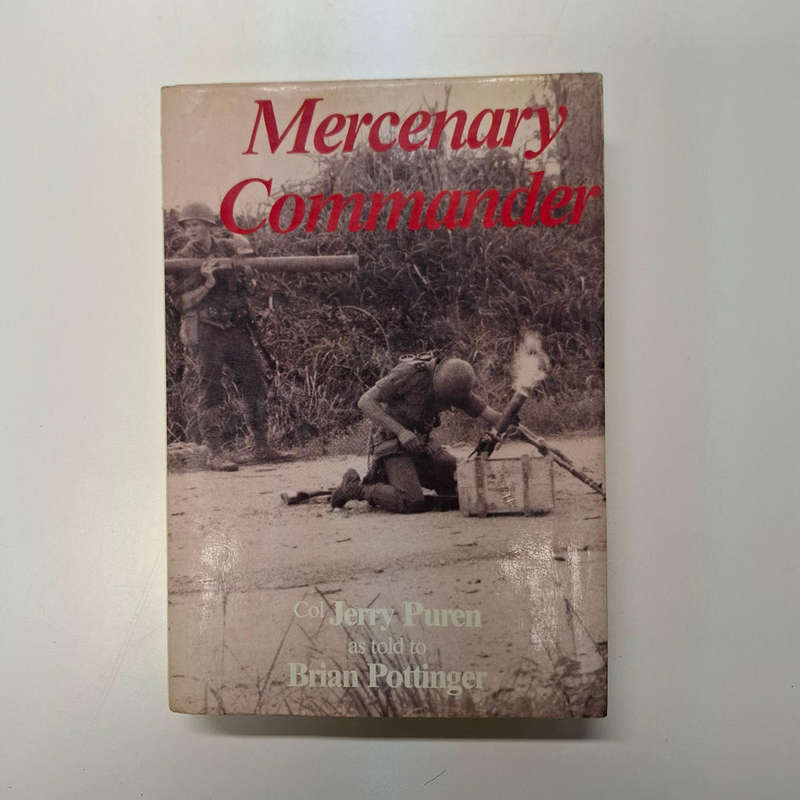 Mercenary commander (Jerry Puren, Brian Pottinger)