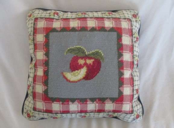 A cute Rug Barn "Needlepoint by hand" tapestry cushion