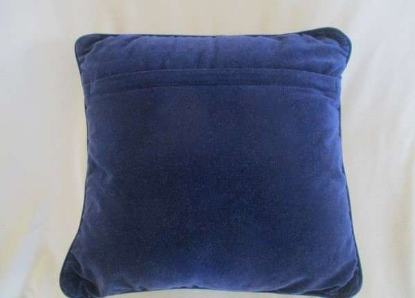 A cute Rug Barn "Needlepoint by hand" tapestry cushion