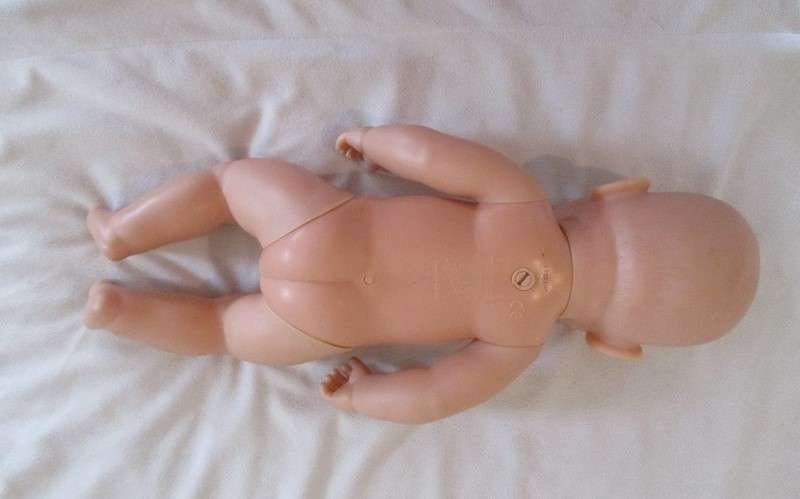A vintage Zapf Creation, Germany anatomically correct Baby Born boy doll