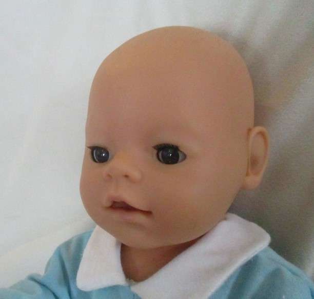 A vintage Zapf Creation, Germany anatomically correct Baby Born boy doll