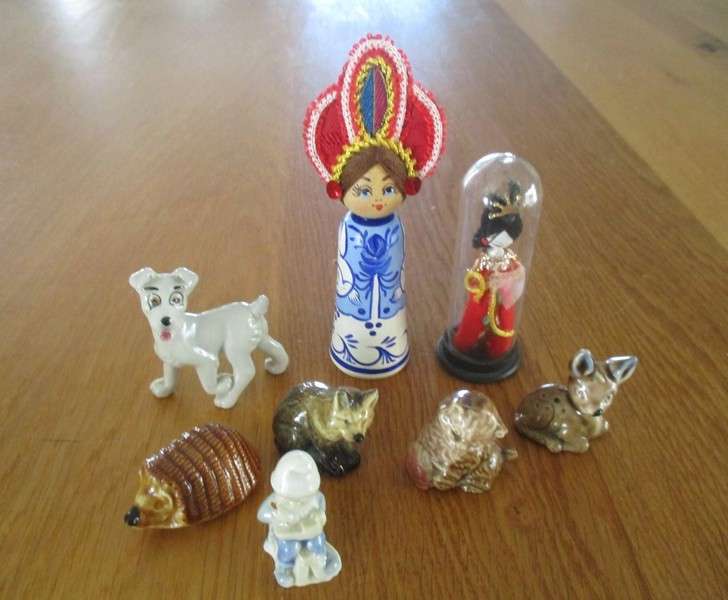 Batch of eight small collectable toys  including Russian and Chinese dolls and Wade Disney dog Tramp