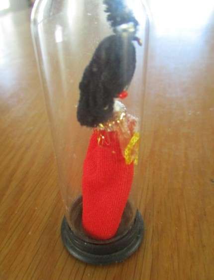 Batch of eight small collectable toys  including Russian and Chinese dolls and Wade Disney dog Tramp