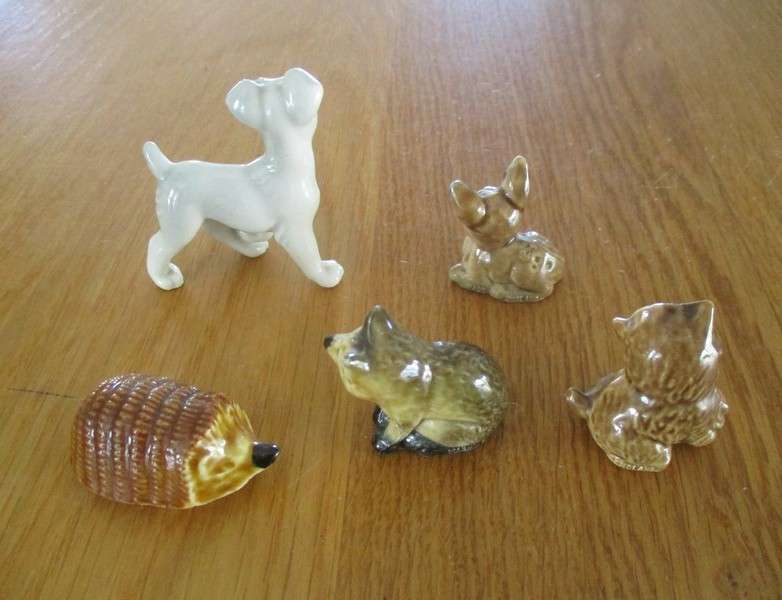 Batch of eight small collectable toys  including Russian and Chinese dolls and Wade Disney dog Tramp