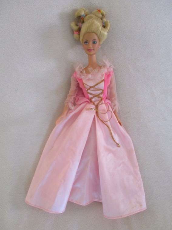 Vintage 1990's Barbie with pull-string length altering hair - knees bend