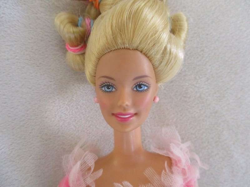 Vintage 1990's Barbie with pull-string length altering hair - knees bend