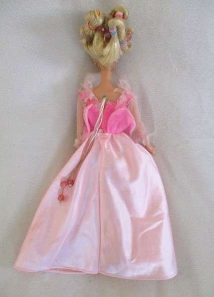 Vintage 1990's Barbie with pull-string length altering hair - knees bend