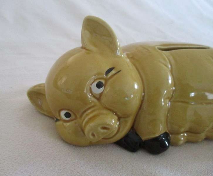 Cute laid back porcelain Piggy bank/savings bank