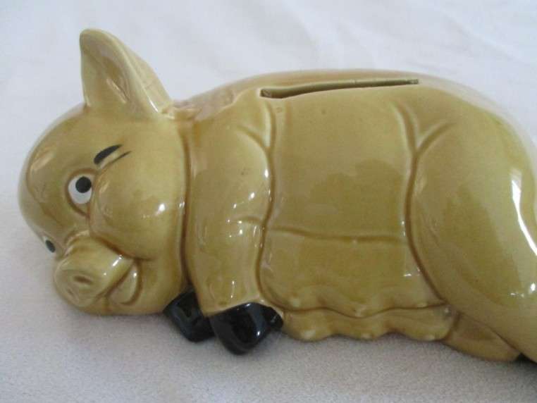 Cute laid back porcelain Piggy bank/savings bank