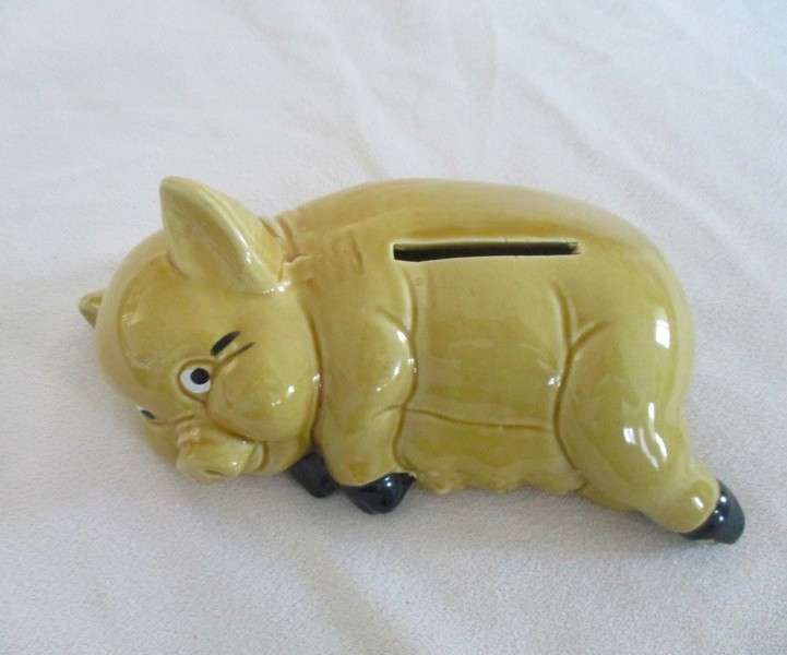 Cute laid back porcelain Piggy bank/savings bank