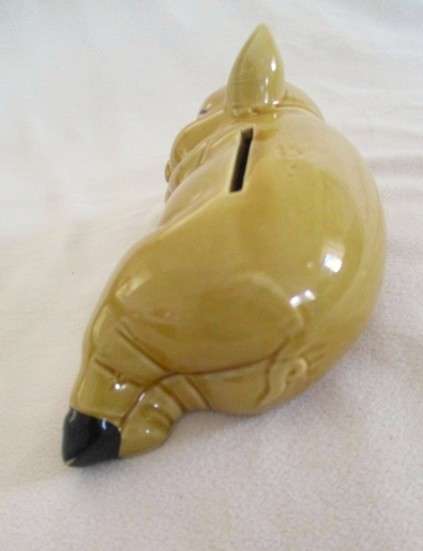 Cute laid back porcelain Piggy bank/savings bank