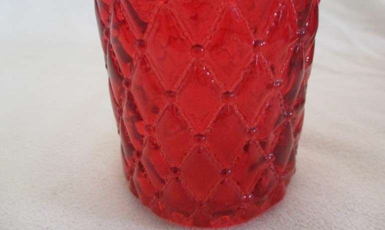Three pretty red glass bottles (please disregard reflections)