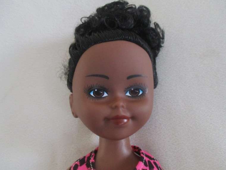 A cute 40cm tall black doll