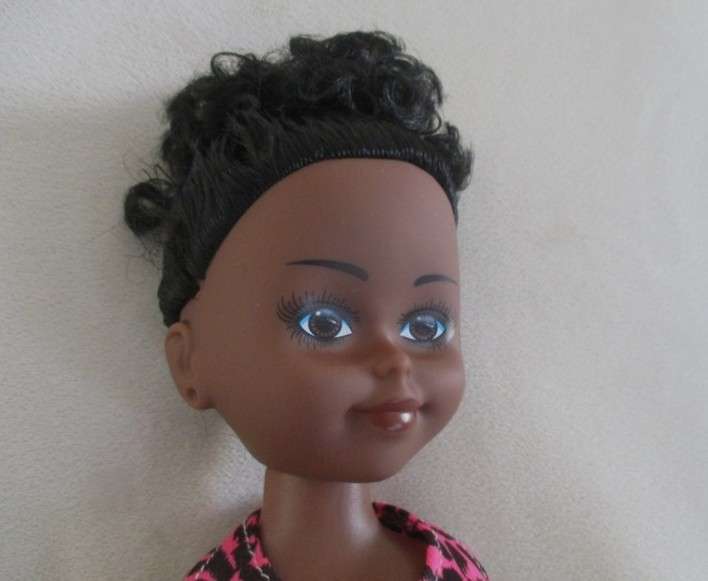 A cute 40cm tall black doll