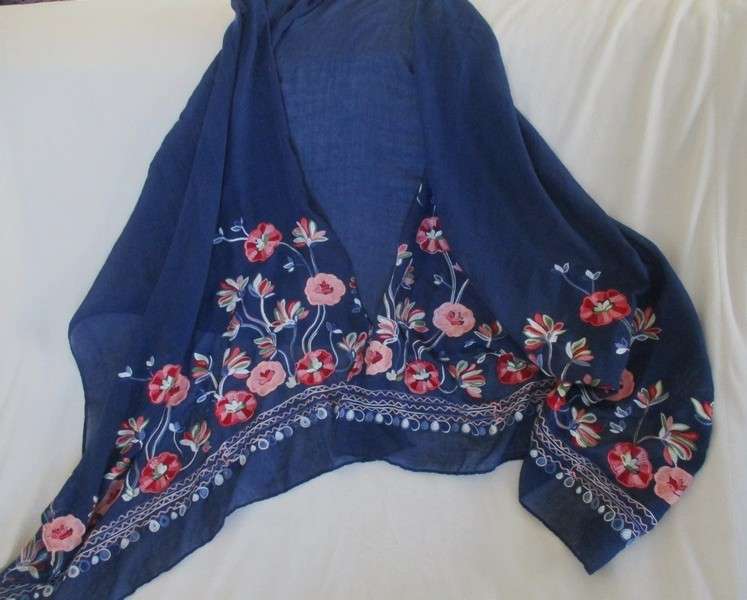 A beautiful embroidered shawl/throw with lovely floral design