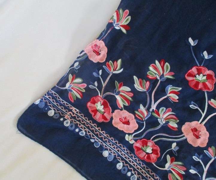A beautiful embroidered shawl/throw with lovely floral design