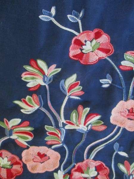 A beautiful embroidered shawl/throw with lovely floral design