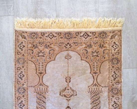 A light weight, machine made  Turkish prayer mat depicting Mosque interior - silk?