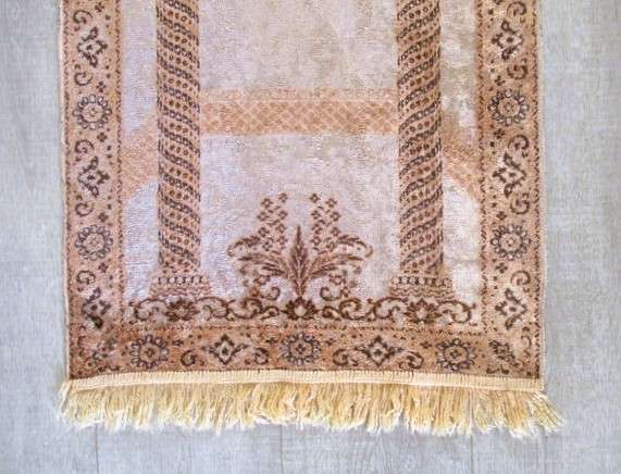 A light weight, machine made  Turkish prayer mat depicting Mosque interior - silk?