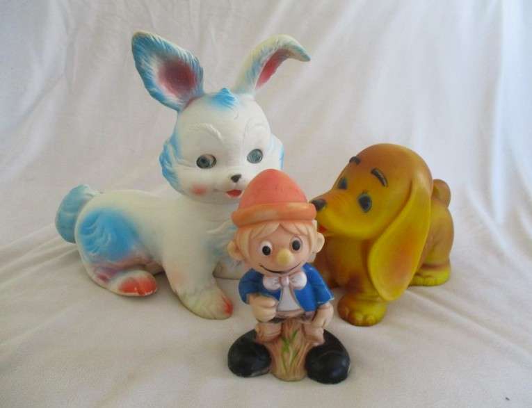 Three vintage rubber nursery toys - Dachshund, Edward Mobley Bunny and Pinocchio