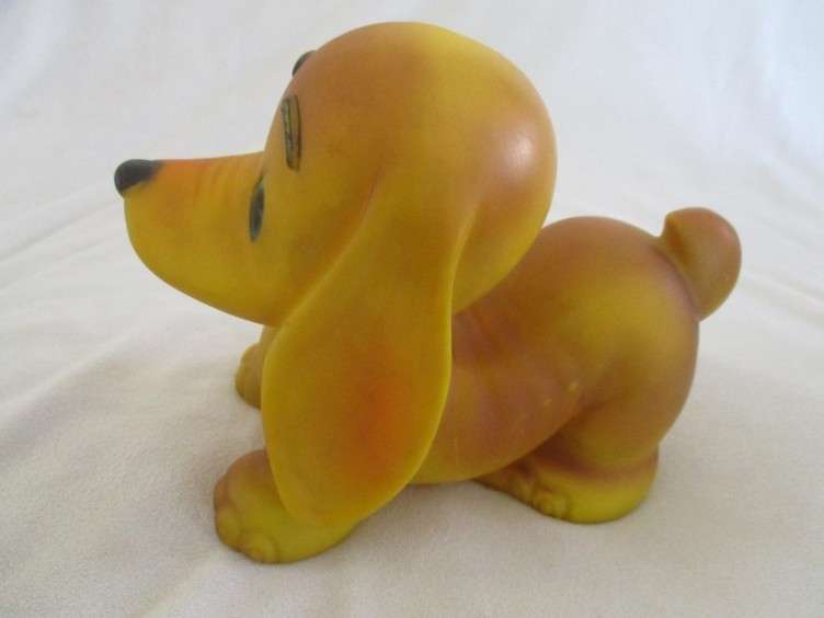 Three vintage rubber nursery toys - Dachshund, Edward Mobley Bunny and Pinocchio