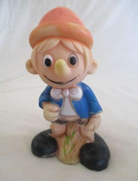 Three vintage rubber nursery toys - Dachshund, Edward Mobley Bunny and Pinocchio
