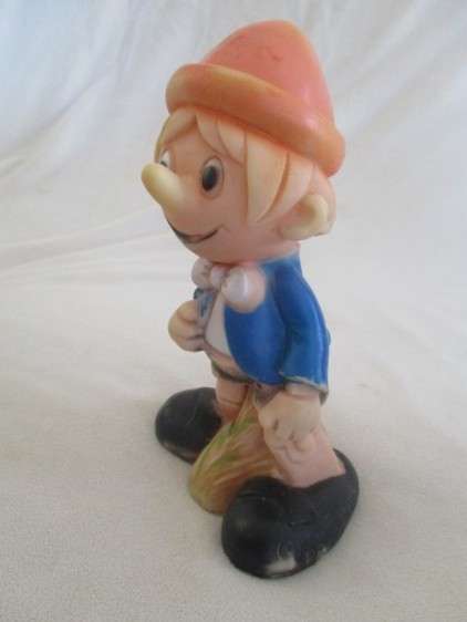 Three vintage rubber nursery toys - Dachshund, Edward Mobley Bunny and Pinocchio