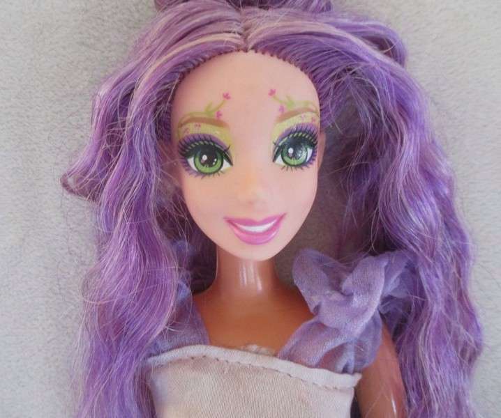 Two pretty reconstructed Mattel Barbie dolls - Magic of the Rainbow Glee and Sleeping Beauty