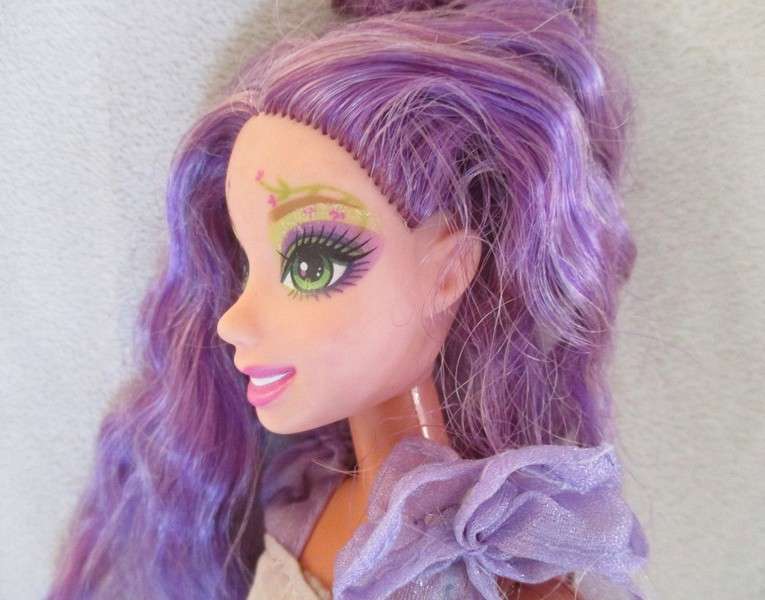 Two pretty reconstructed Mattel Barbie dolls - Magic of the Rainbow Glee and Sleeping Beauty