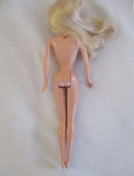 Two pretty reconstructed Mattel Barbie dolls - Magic of the Rainbow Glee and Sleeping Beauty