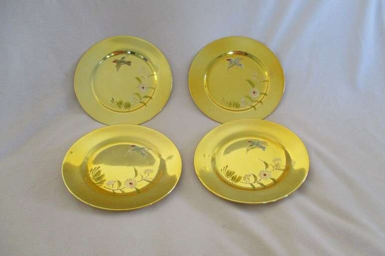 Four beautiful hand painted porcelain gold cake/side plates (disregard reflections)