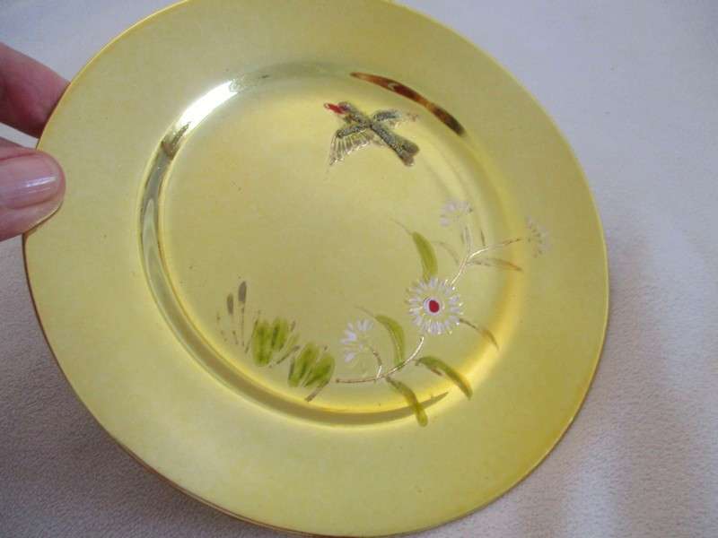 Four beautiful hand painted porcelain gold cake/side plates (disregard reflections)