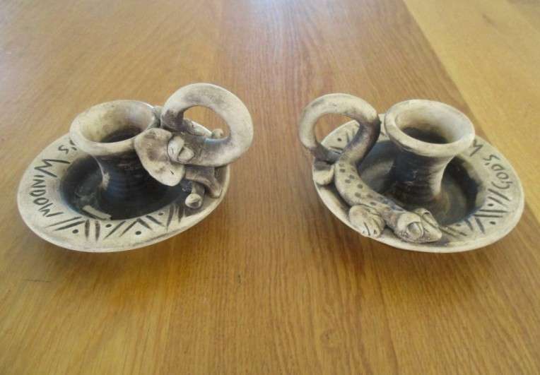 Two quaint handcrafted pottery candlesticks from God's Window - gecko and elephant
