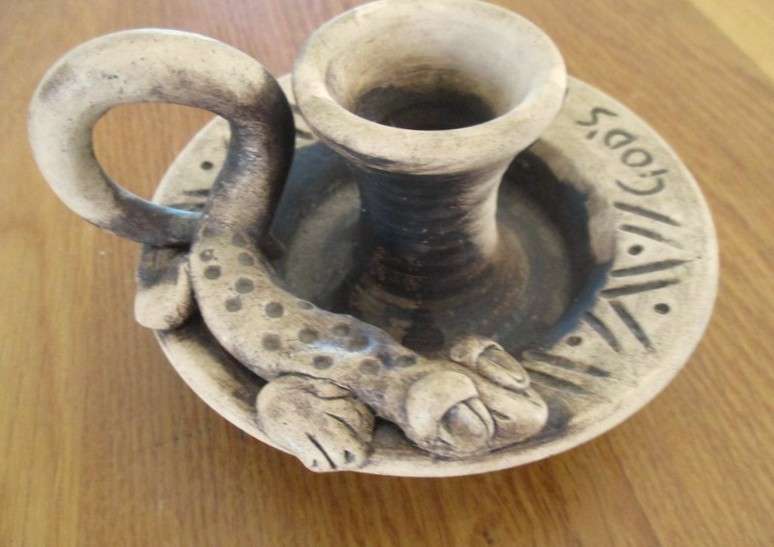 Two quaint handcrafted pottery candlesticks from God's Window - gecko and elephant