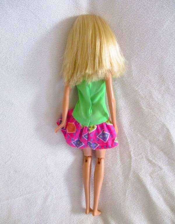 A pretty Mattel Barbie doll  with articulated knees