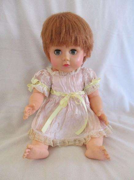 A well made vintage doll with separated toes - marked "J" on back of head