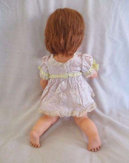 A well made vintage doll with separated toes - marked "J" on back of head