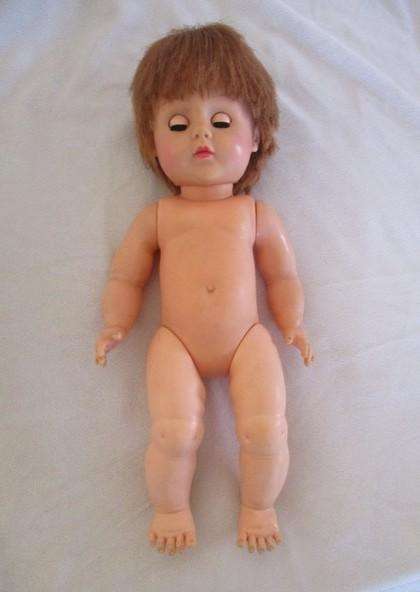 A well made vintage doll with separated toes - marked "J" on back of head