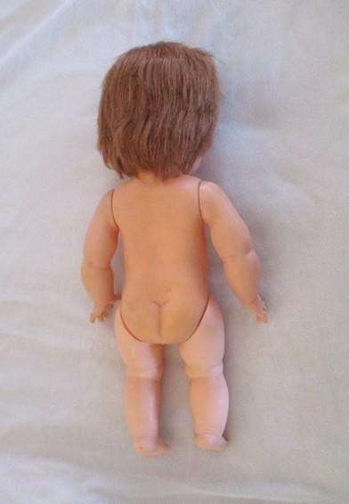 A well made vintage doll with separated toes - marked "J" on back of head