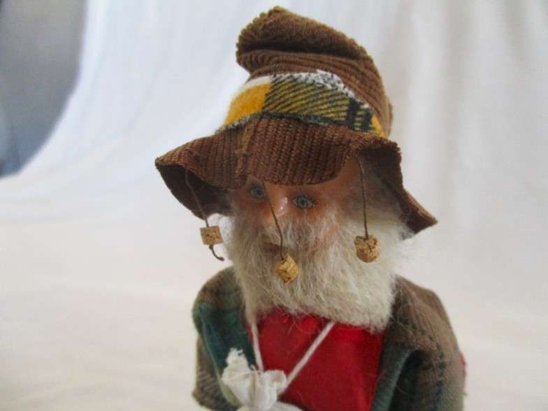 Cute vintage Australian Swagman doll on stand