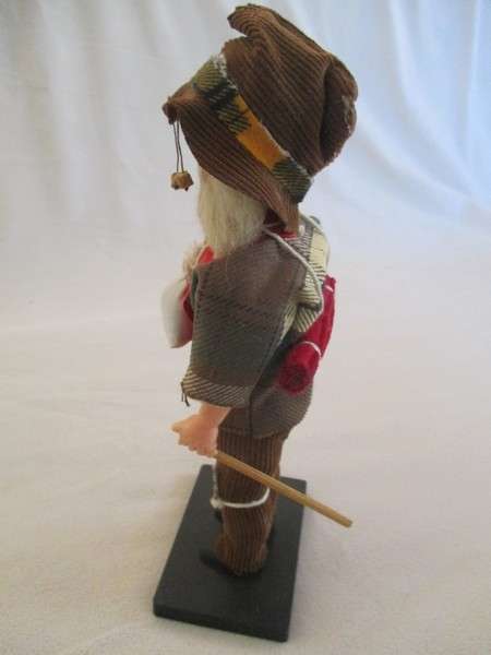 Cute vintage Australian Swagman doll on stand