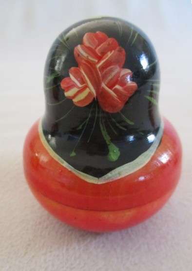 Four piece set of vintage genuine Russian wooden hand painted Matryoshka nesting dolls