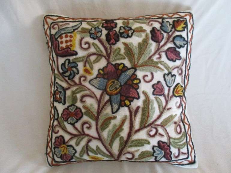 Lovely copiously embroidered cushion with floral design