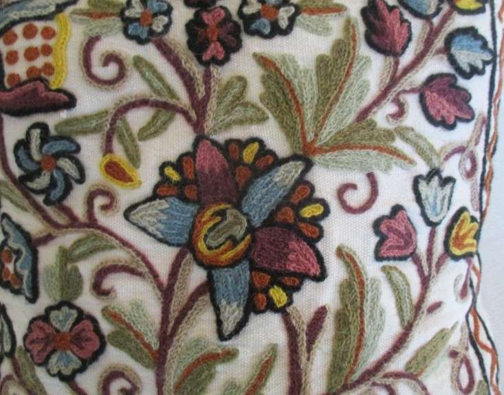 Lovely copiously embroidered cushion with floral design
