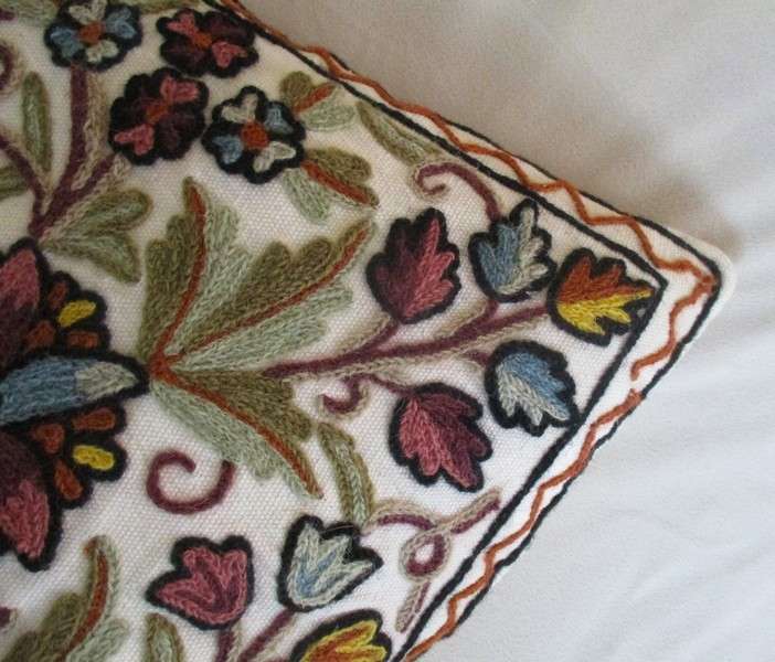 Lovely copiously embroidered cushion with floral design